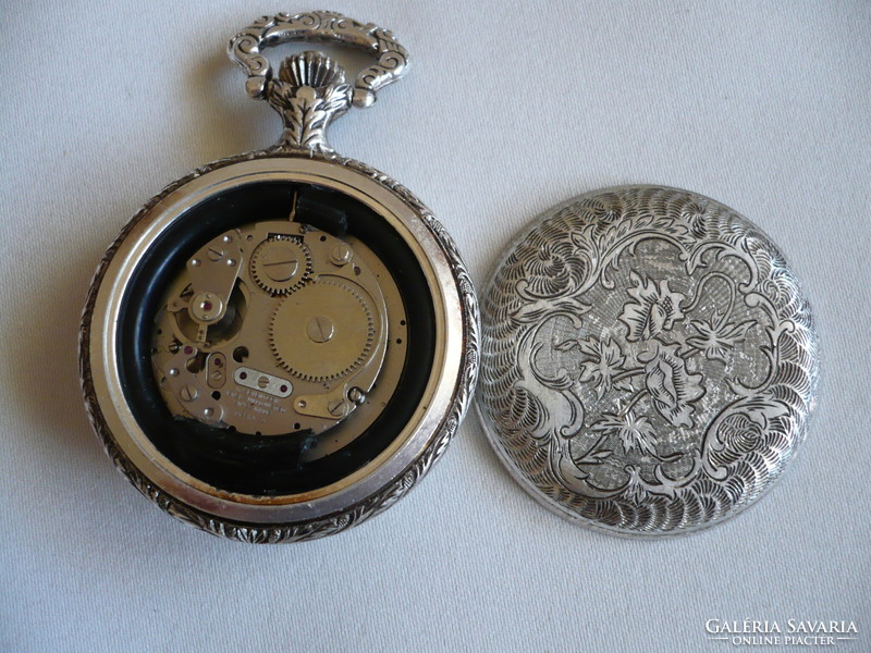 Santus is a beautifully decorated and very rare Swiss mechanical pocket watch with a hunting scene