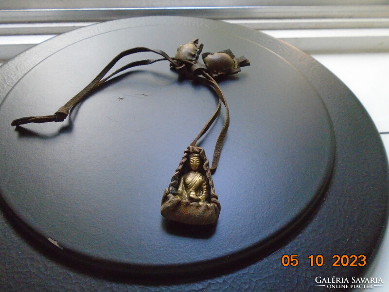 Antique healing ghau bronze buddha talisman in original sheepskin