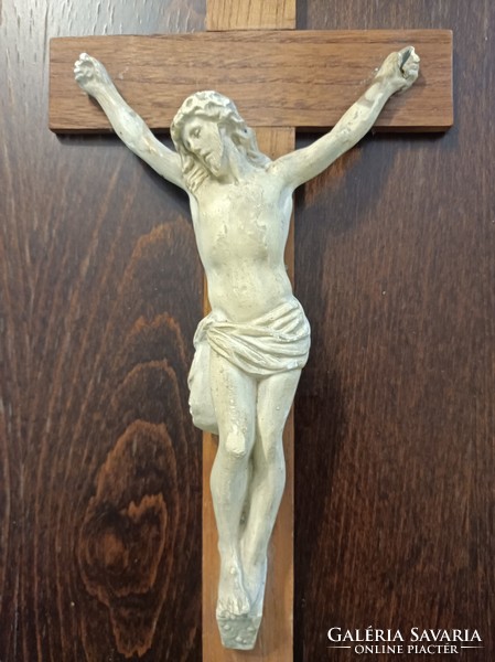 Wooden cross, damaged, with plaster body.