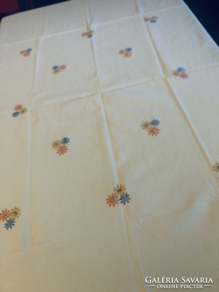 Handmade fine old woven fabric with flowers embroidered on it. Tablecloth, tablecloth
