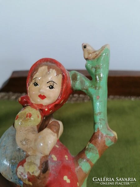 Old ceramic little girl with polka dot headscarf