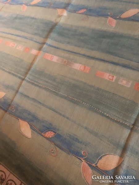A small colorful curtain or tablecloth in the middle of the table