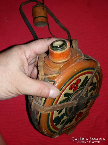 Antique carved painted wooden folk artist applique inside glass water bottle in beautiful condition according to the pictures