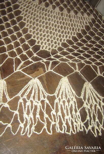 Beautiful ecru hand-crocheted round lace tablecloth