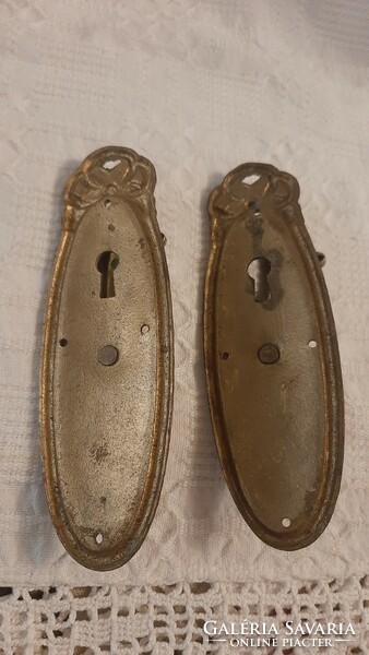 Wonderful antique copper door decorations paired with a bow pattern