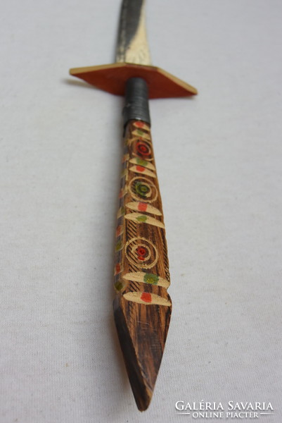 Arabic dagger with carved wooden handle and decorated blade