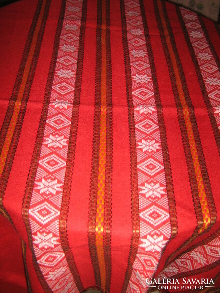 Beautiful red fringed elegant woven tablecloth