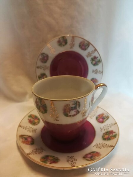 Unmarked porcelain coffee cup with two coasters.