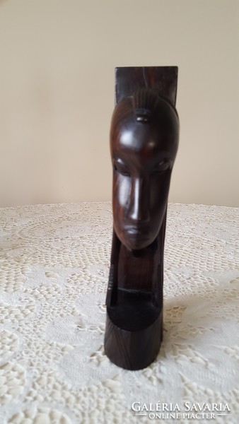 Female head carved from African ironwood