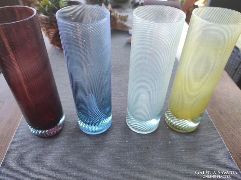 Colored thick-walled glass glasses.