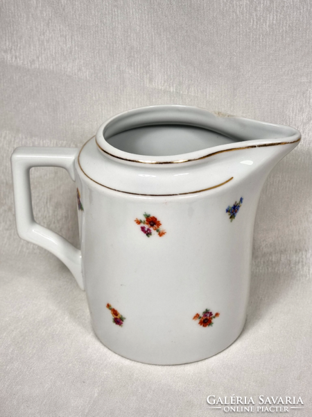 Zsolnay 0.5 l milk jug with shield seal and gold painted rim with flower pattern.