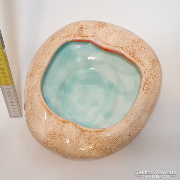 Brown, blue-glazed ceramic ashtray marked 