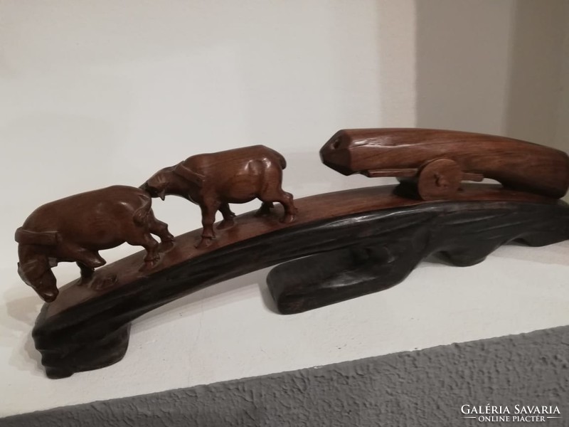 Oriental wood carving: buffaloes pulling logs, marked 40 cm