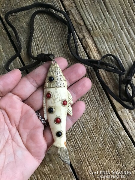 Old cartier style bone fish pendant on a leather necklace