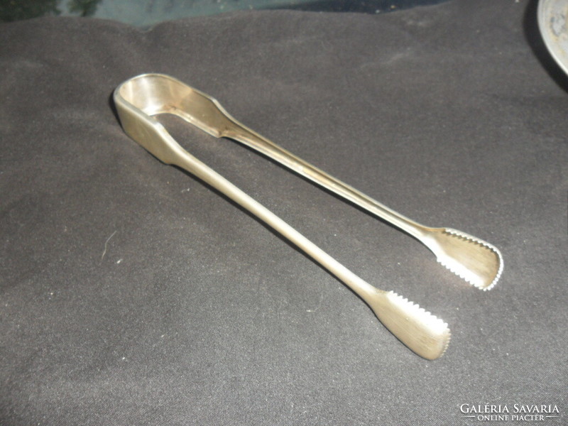 Large silver sugar tongs