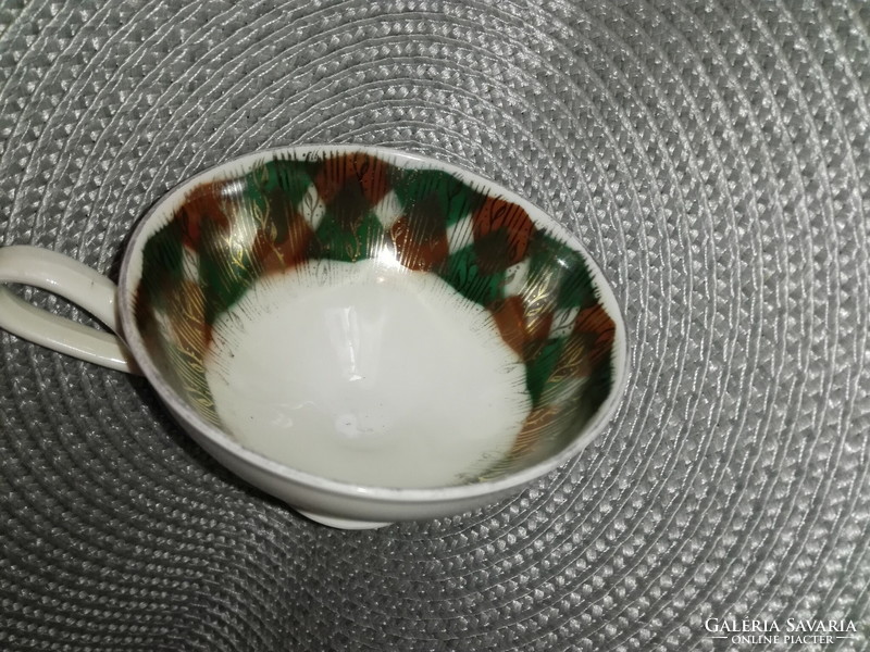 Porcelain tea cup.