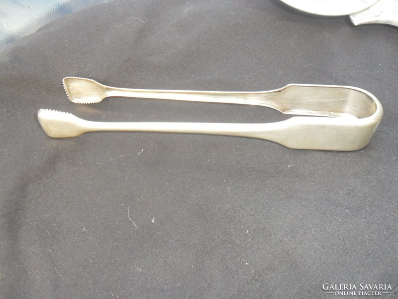 Large silver sugar tongs