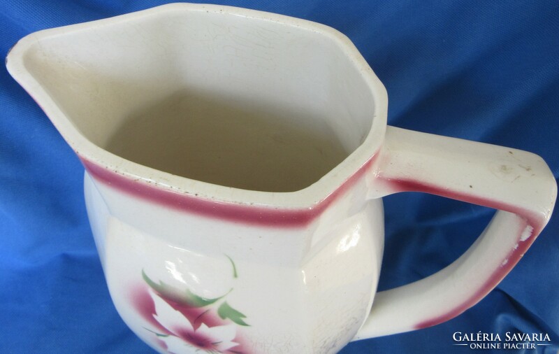 Old granite jug with flower pattern, marked 26 cm high