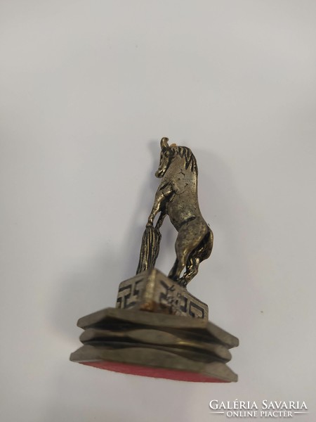 Metal equestrian statue