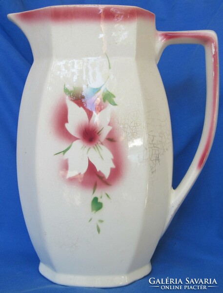 Old granite jug with flower pattern, marked 26 cm high