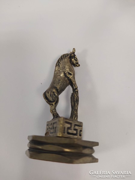 Metal equestrian statue