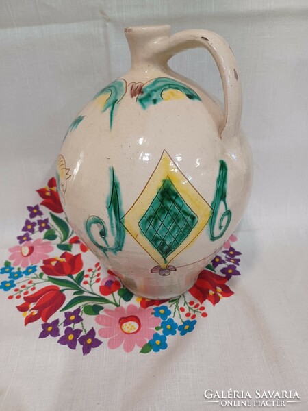 Traditional painted-glazed earthenware jug