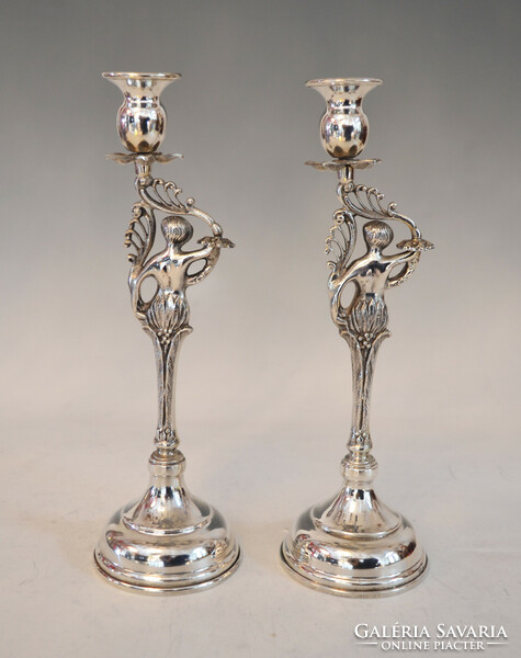 Silver double candle holder with plastic figure