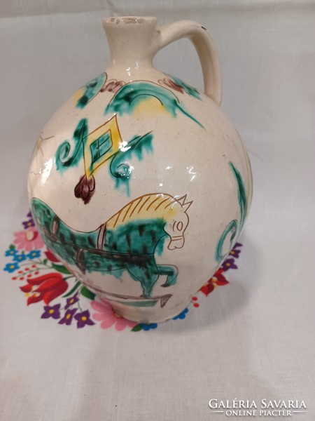 Traditional painted-glazed earthenware jug