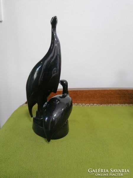 A pair of rare hóllóháza porcelain guinea fowls, black porcelain