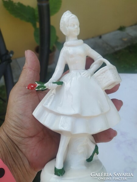 Porcelain female statue for sale! A lady picking flowers with a basket for sale!