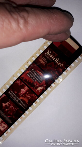 Old colorful fairy tale slide film - robin hood is the leader of the hideouts according to the pictures