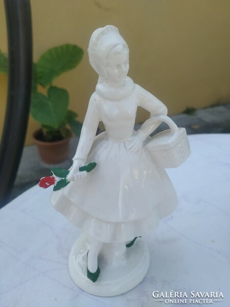 Porcelain female statue for sale! A lady picking flowers with a basket for sale!