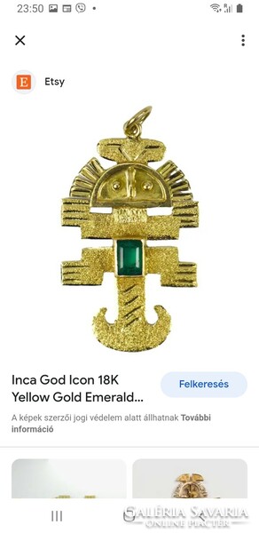 Silver Inca totem amulet pendant decorated with emeralds
