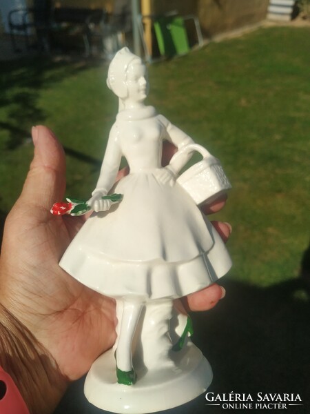 Porcelain female statue for sale! A lady picking flowers with a basket for sale!