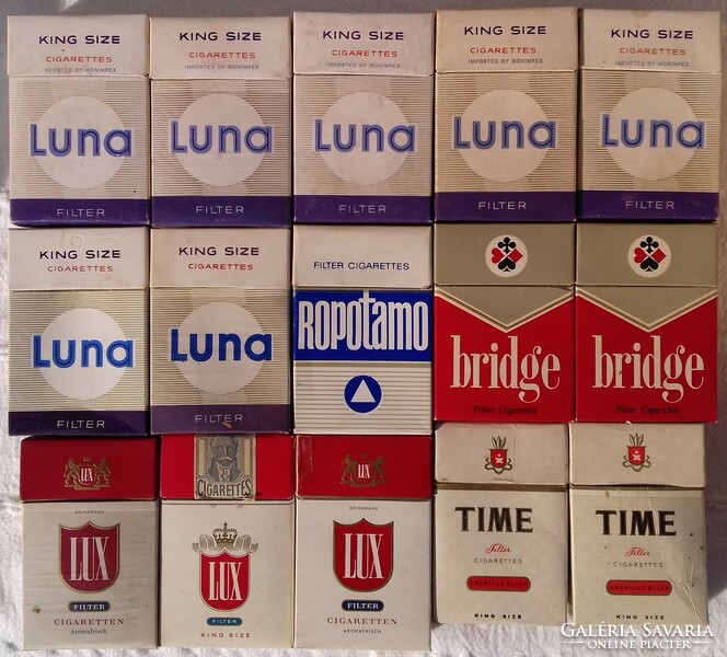 Old foreign empty cigarette boxes in pieces