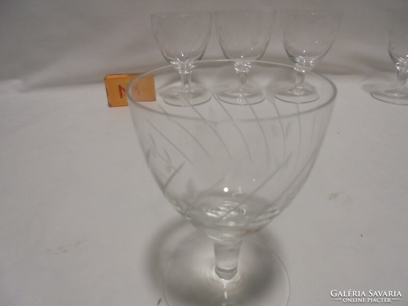 Six stemmed wine and champagne glasses, goblet - together - incised leaf pattern