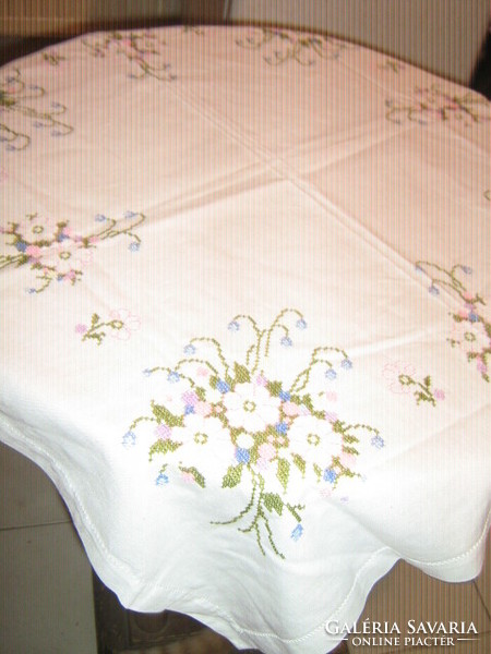 Beautiful vintage rosy elegant beige machine embroidered tablecloth