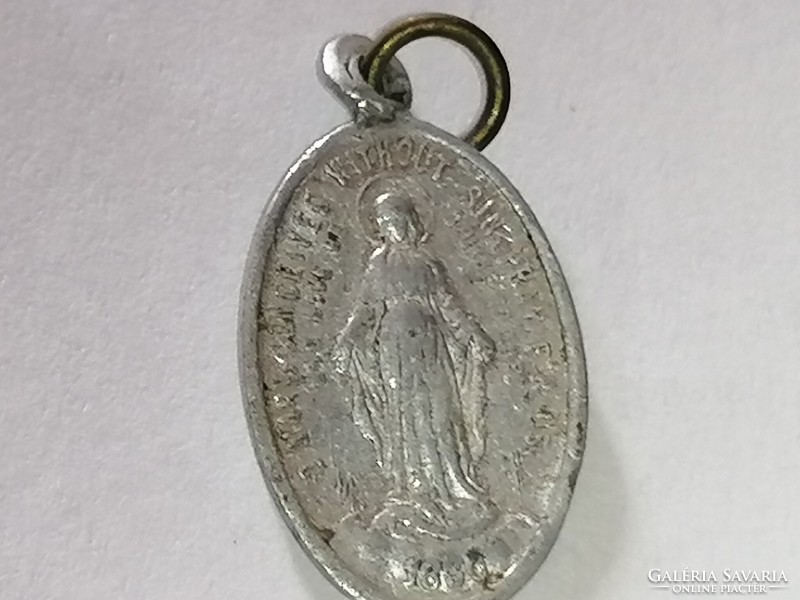 Old amulet holder, inside a pendant and a miniature statue of St. Antal 315.