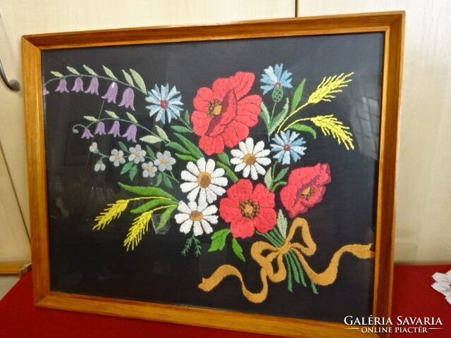 Embroidered wall picture. The base is black canvas, it depicts a spring bouquet, size: 47x37 cm. Jokai.