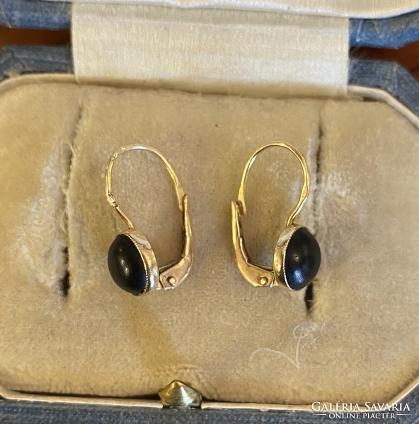 Old 14-karat gold earrings with beak!