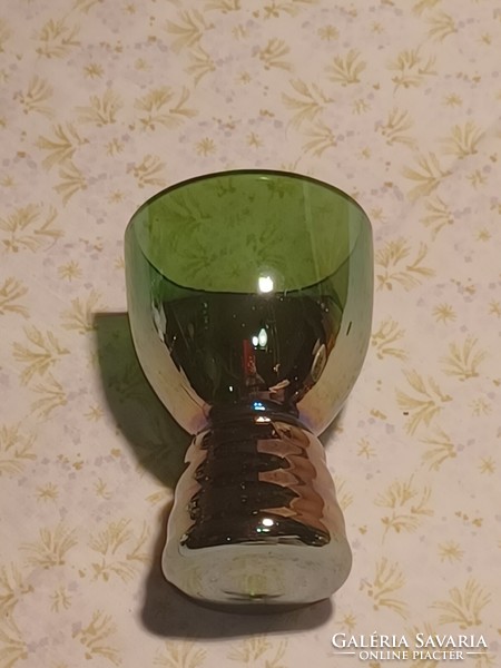 Glass cup with luster glaze on the bottom