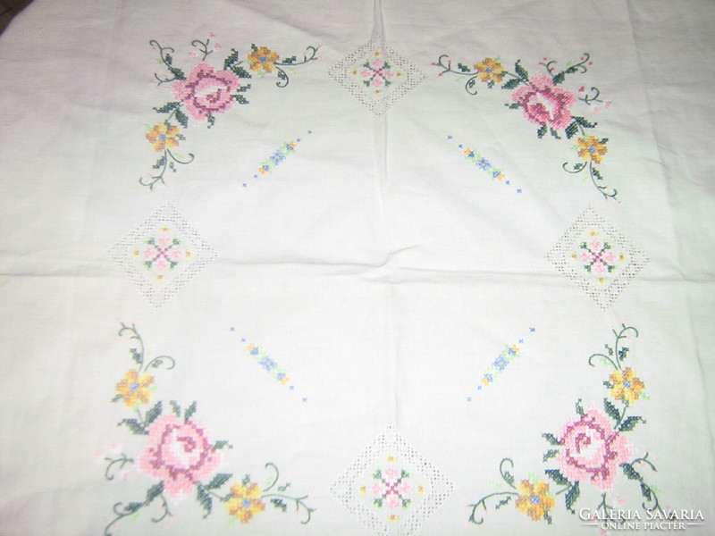 Beautiful rose tablecloth embroidered with small cross stitches