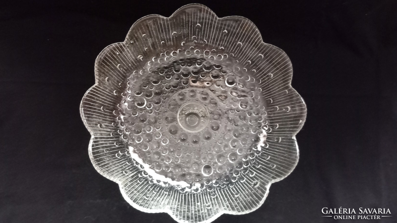 Glass serving bowl with base, table in the middle