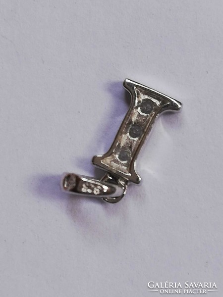 Silver pendant with the letter i