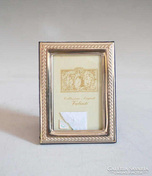 Silver picture frame with braided decor (on4)