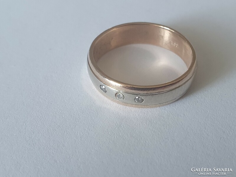 14K women's wedding ring with 3 cubic zirconia 4.12g
