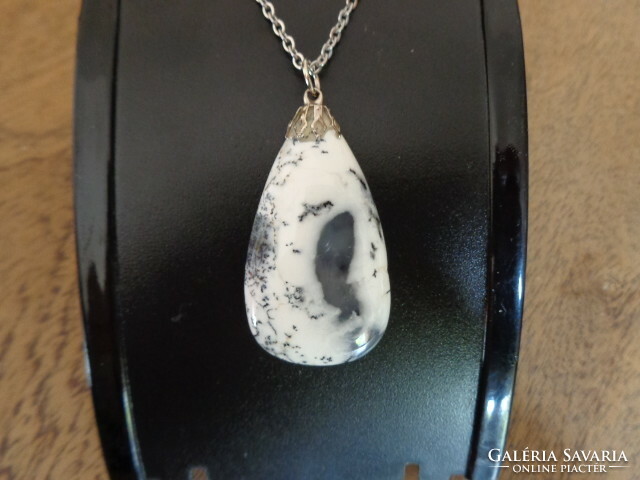 Merlinite is a very beautiful pendant and chain