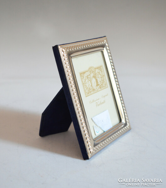 Silver picture frame with braided decor (on4)