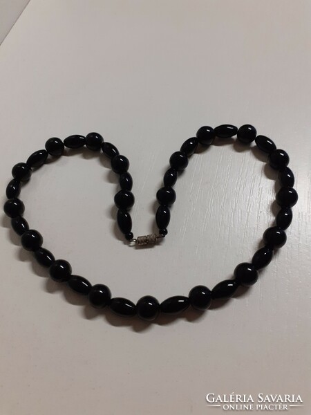 Retro black necklace with screw switch in good condition