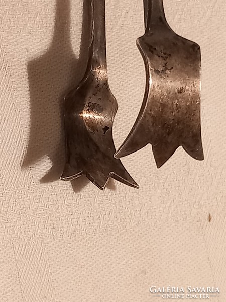 Silver sugar tongs, marked